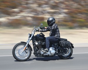 Photo of man on motorcycle with saddlebags installed